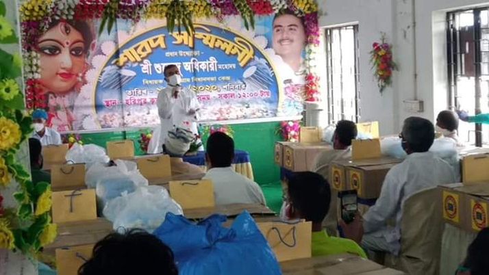 Shuvendu Adhikary  giving  gifts to the families of martyrs and wounded in Nandigram