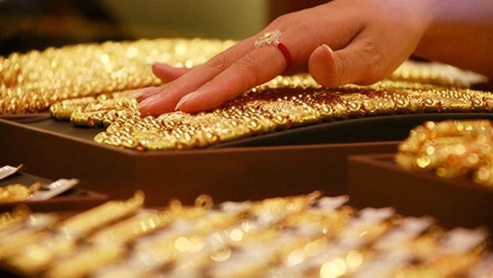 Record fall in gold prices