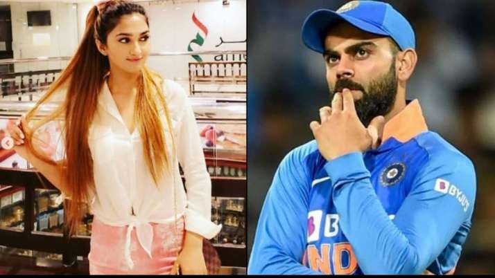 Is the wife of a Pakistani cricketer cracking her throat for Kohli? ‌ Really weird