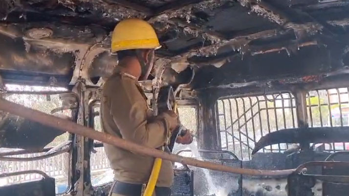 A moving bus caught fire in Newton, one engine of a Fire Briged at the scene