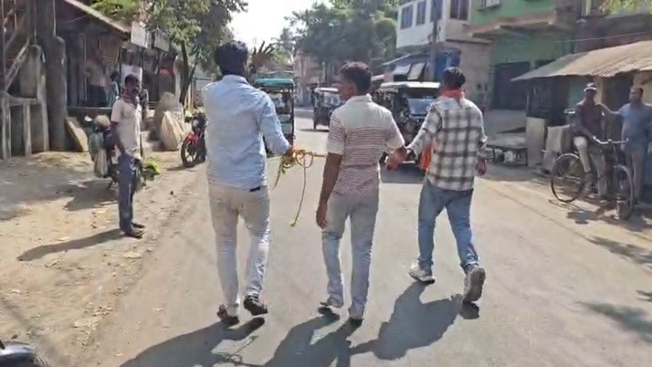 Locals paraded a Trinamool leader around Amodpur after tying him up with a rope.