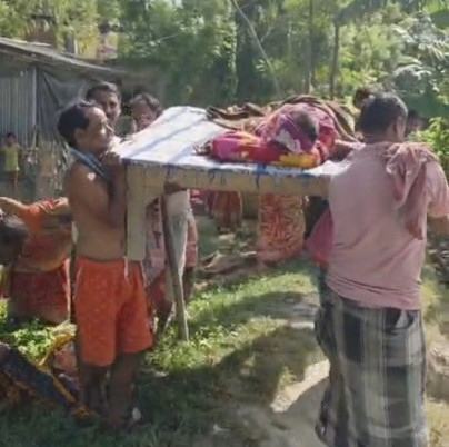 Villagers rushed the patient to the hospital on a cot.