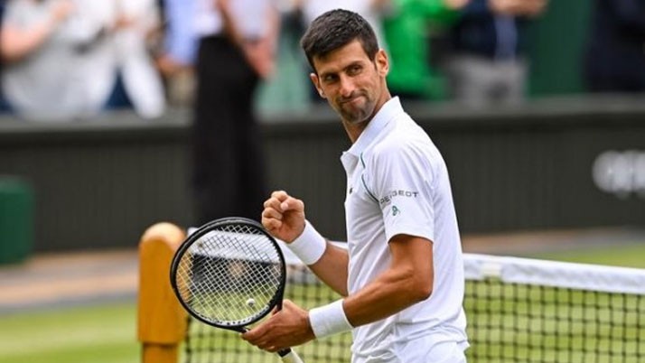 Italy's Beretini in front of Djokovic in the Wimbledon final